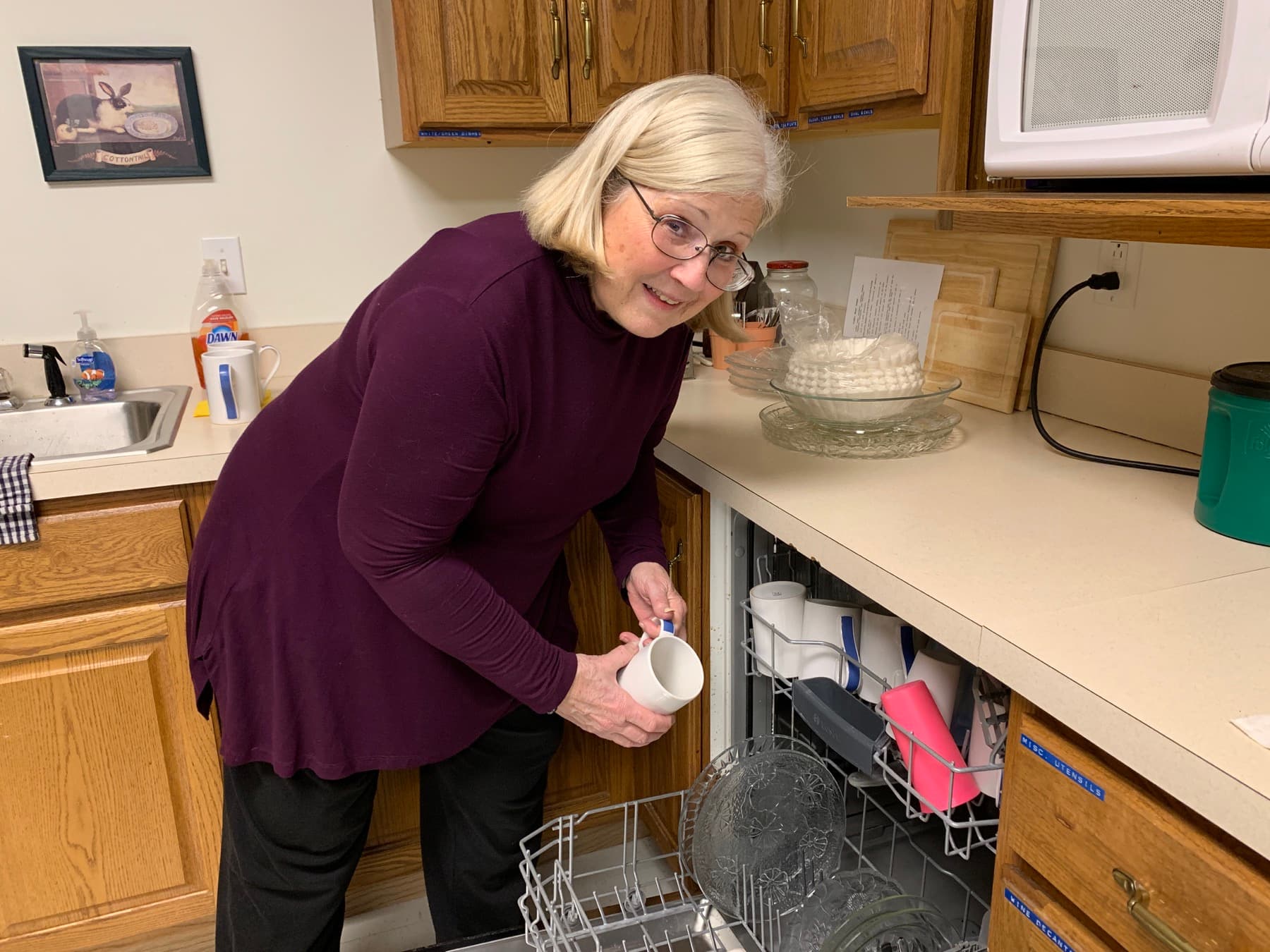 A St. Andrew's parishioner preparing hospitality after worship
